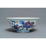 A Chinese blue, white and underglaze red 'Buddhist lion' bowl, Qianlong mark and of the period