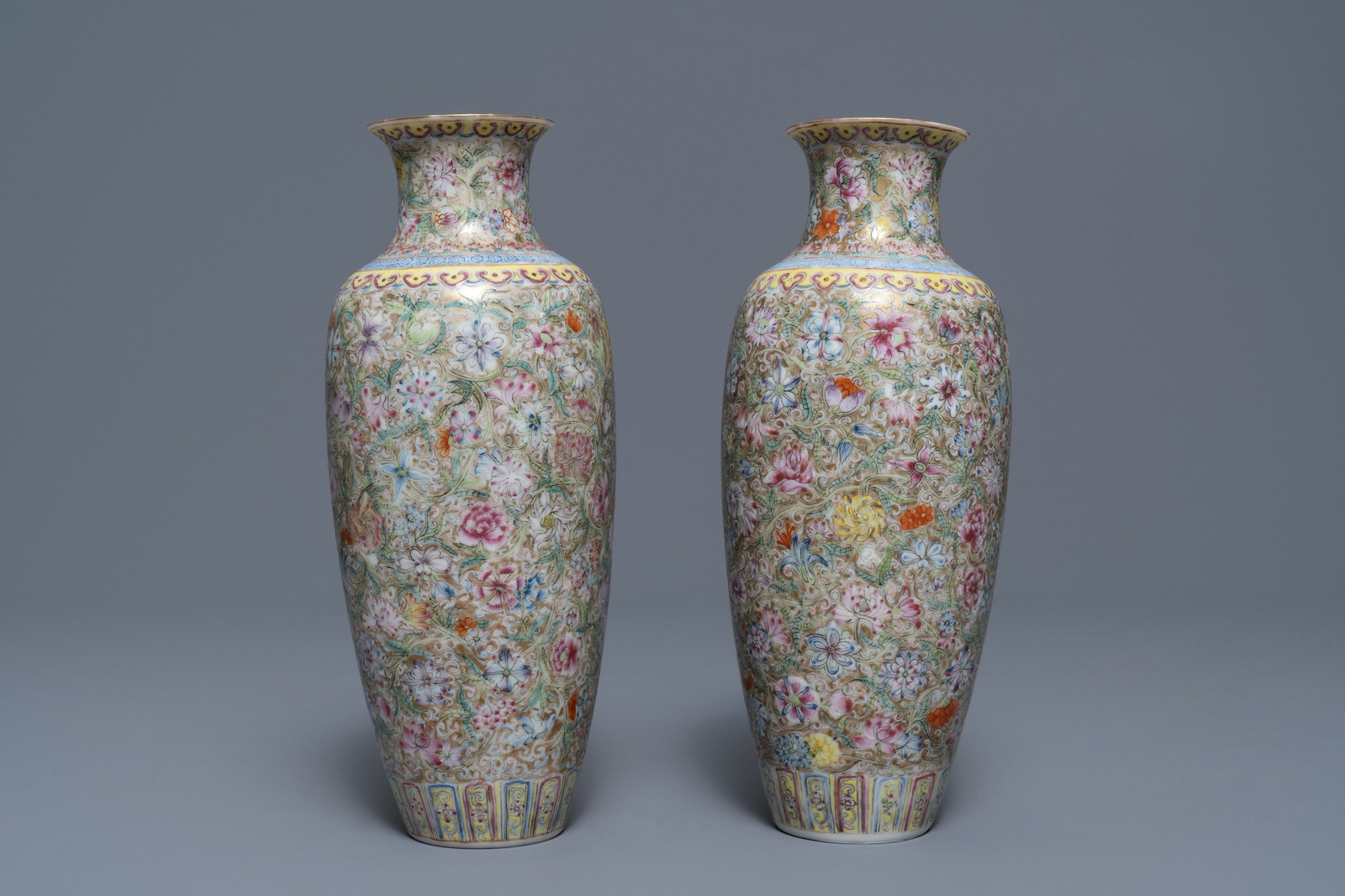 A pair of Chinese famille rose 'millefleurs' eggshell vases, Qianlong mark, Republic, 20th C. - Image 5 of 8