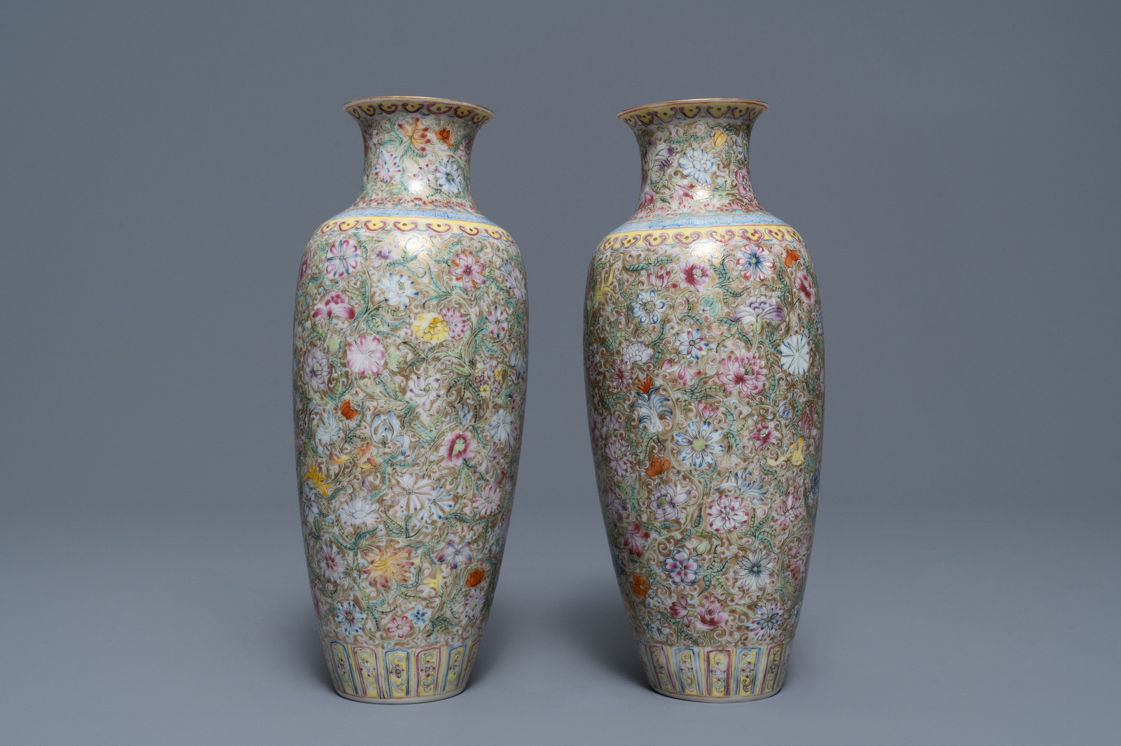 A pair of Chinese famille rose 'millefleurs' eggshell vases, Qianlong mark, Republic, 20th C. - Image 3 of 8