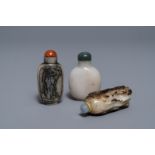 Three Chinese greyish white and black and white jade snuff bottles, 19/20th C.