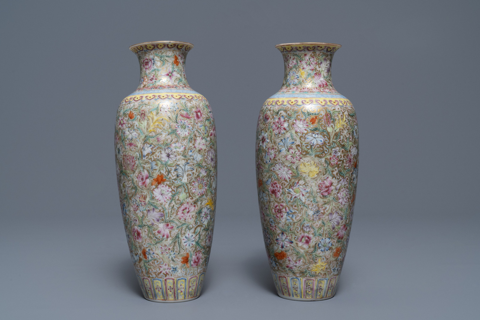 A pair of Chinese famille rose 'millefleurs' eggshell vases, Qianlong mark, Republic, 20th C. - Image 4 of 8