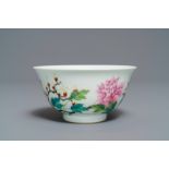 A Chinese famille rose bowl with floral design, Yongzheng mark, 19/20th C.