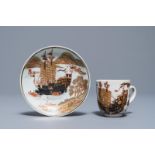 A Chinese grisaille and gilt cup and saucer with a large ship, Yongzheng/Qianlong