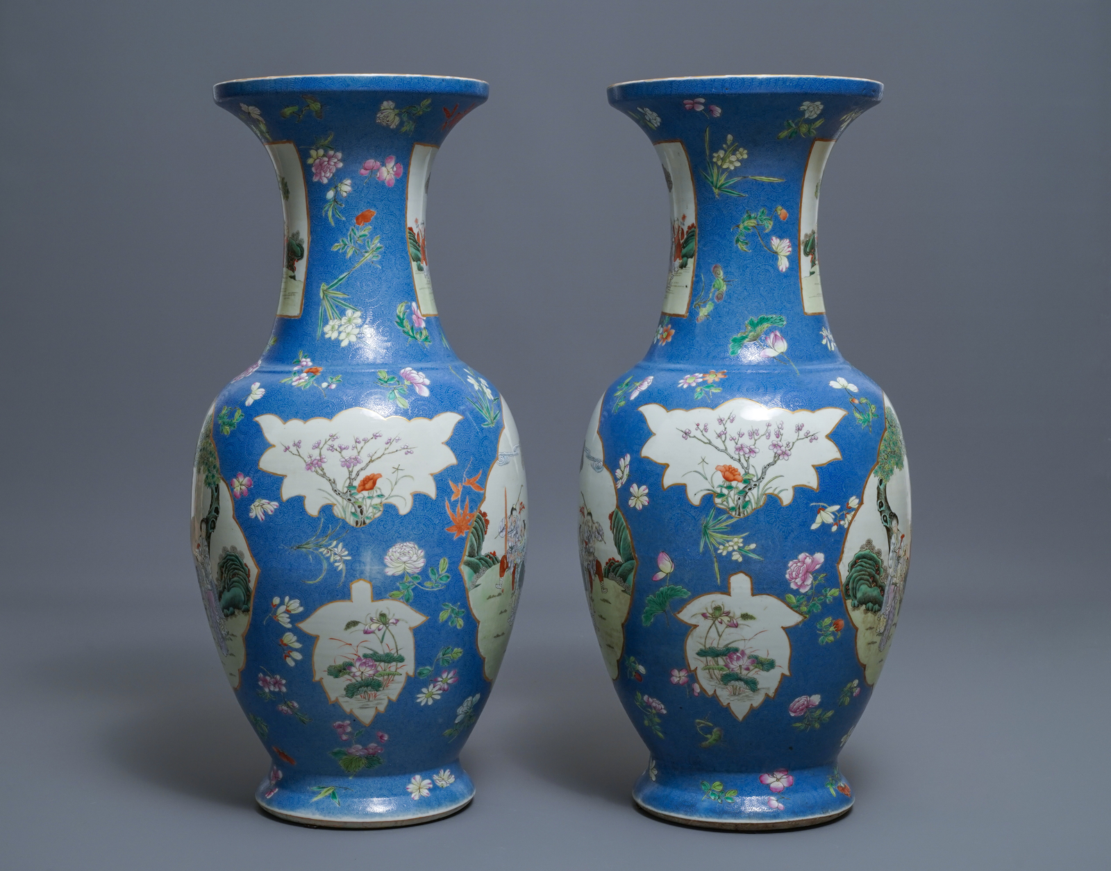 A pair of large Chinese blue-ground famille rose vases with figural design, Qianlong mark, 19th C. - Image 2 of 6