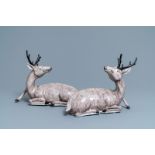 A pair of large Chinese aubergine-glazed models of recumbent deer, 18/19th C.