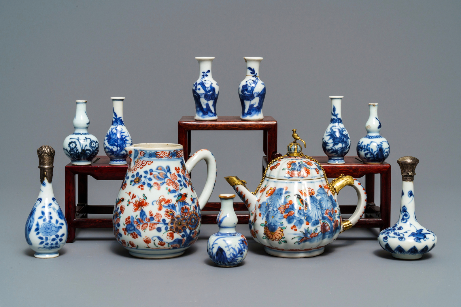 Nine Chinese blue & white miniature vases, 'Amsterdams bont' teapot and a milk jug, Kangxi & later