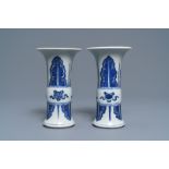 A pair of Chinese blue and white 'gu' vases, Kangxi