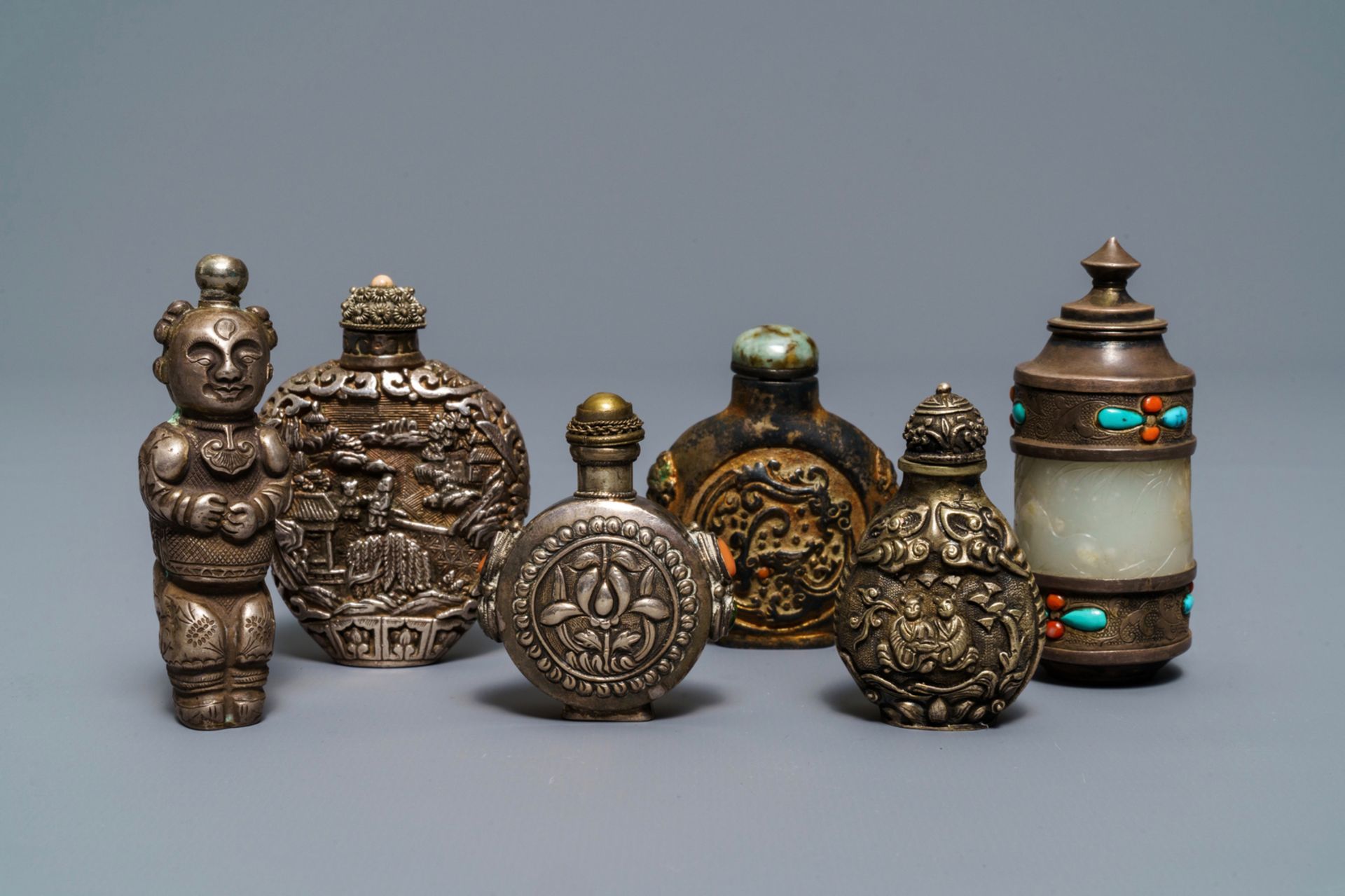 Six Chinese coral and turquoise-inlaid silver and jade snuff bottles, 19/20th C.