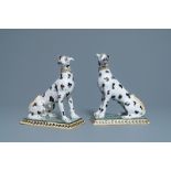 A pair of polychrome Brussels faience models of spotted greyhound dogs, 18th C.