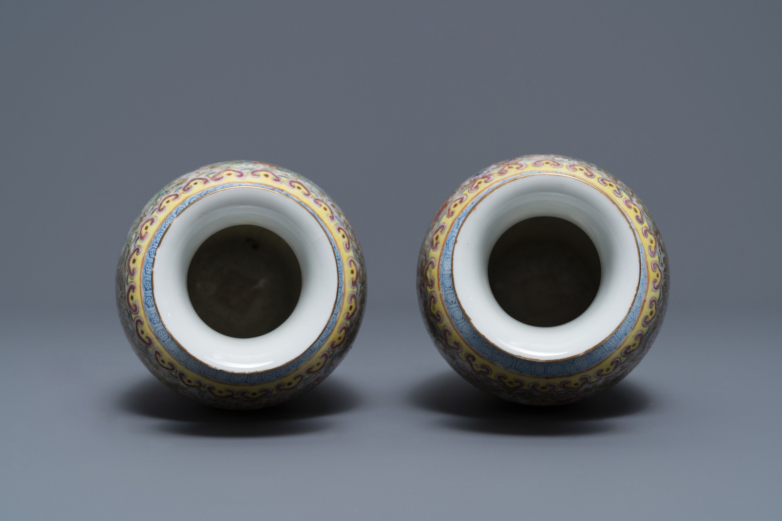 A pair of Chinese famille rose 'millefleurs' eggshell vases, Qianlong mark, Republic, 20th C. - Image 7 of 8