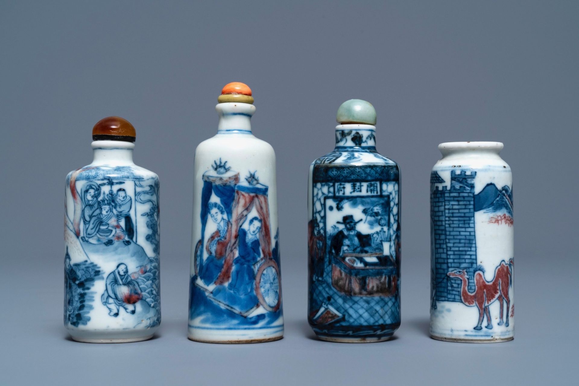 Four Chinese blue, white and underglaze red snuff bottles, 18/19th C.