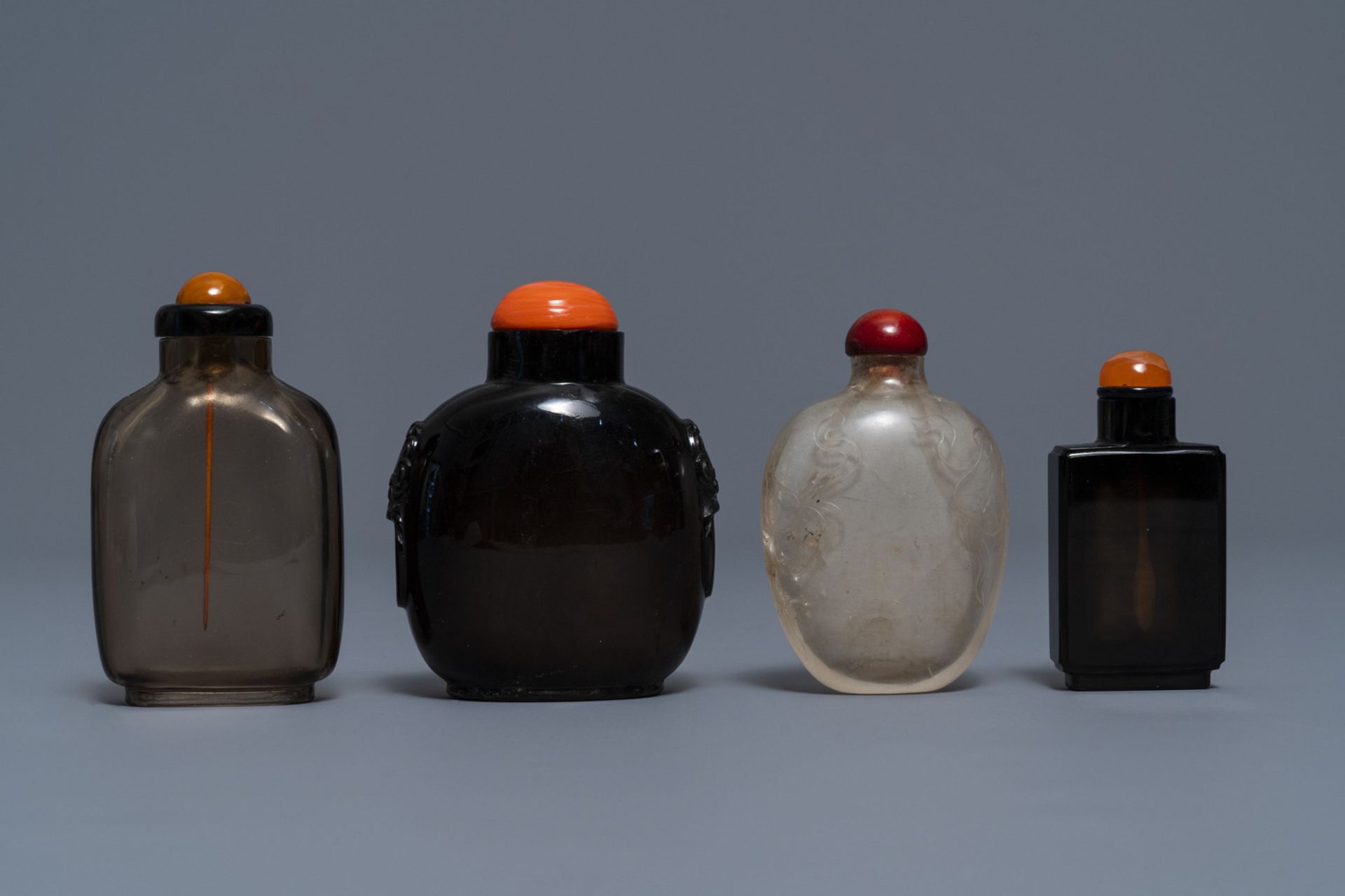 Four Chinese smokey quartz and simulating glass snuff bottles, 18/19th C. - Image 2 of 4