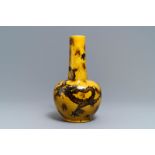 A Chinese yellow-ground bottle vase with a dragon, Qianlong mark, 19/20th C.
