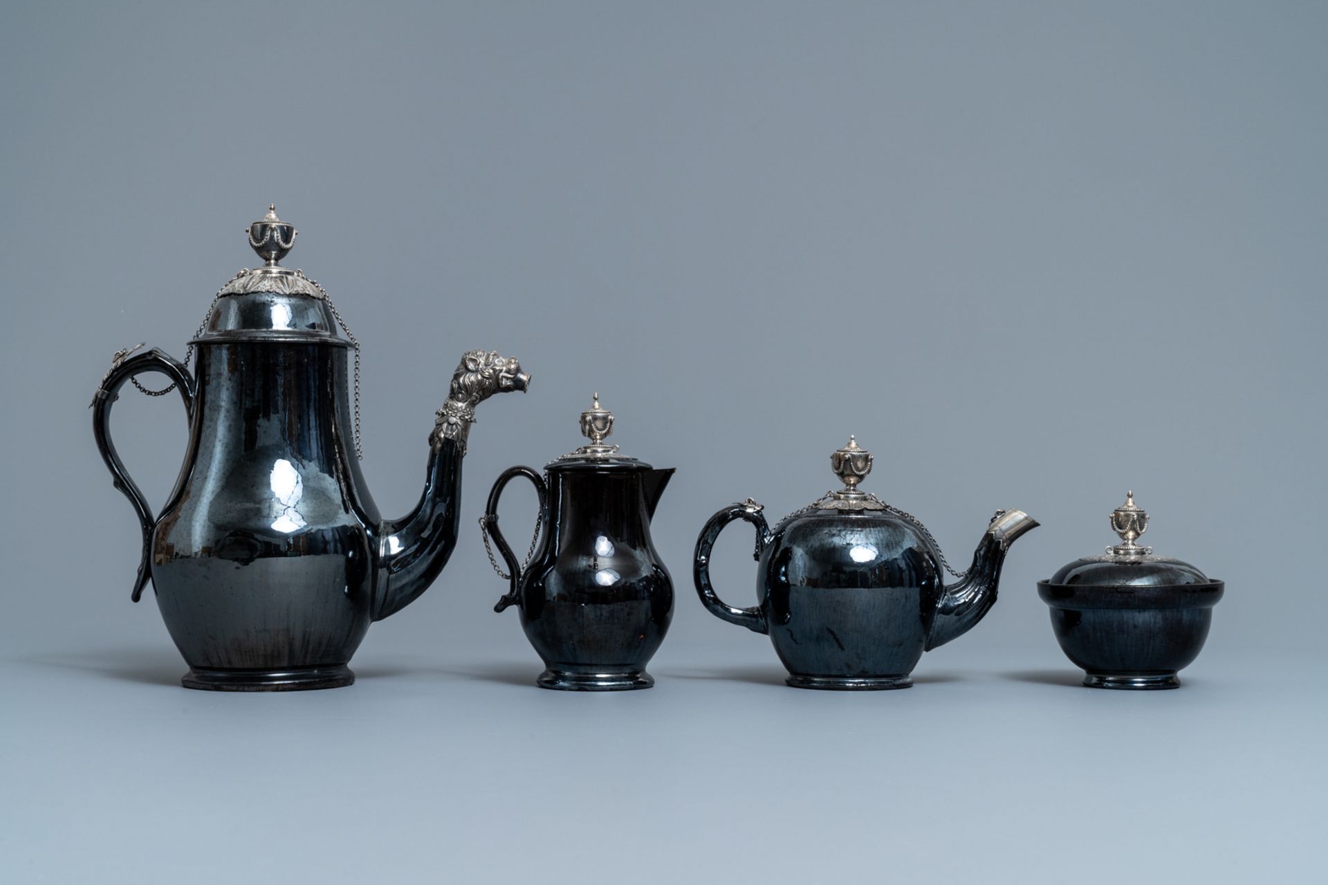 A four-piece silver-mounted Namur black-glazed pottery coffee service, 18th C. - Image 2 of 7