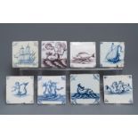 Eight Dutch Delft blue and white and manganese tiles with ships and sea creatures, 17/18th C.