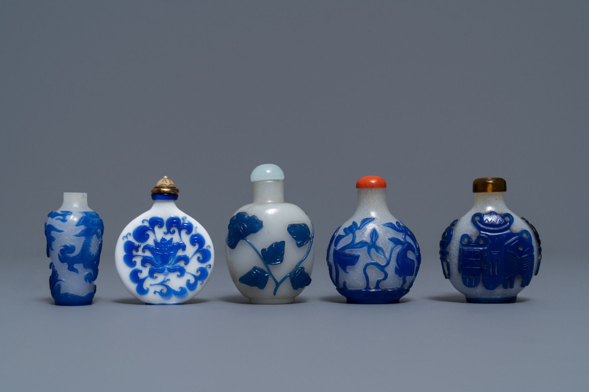 Nine various Chinese blue overlay glass snuff bottles, 19/20th C. - Image 3 of 9