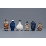 Six Chinese famille rose, blanc de Chine & faux-lapis lazuli relief snuff bottles, 19/20th C.