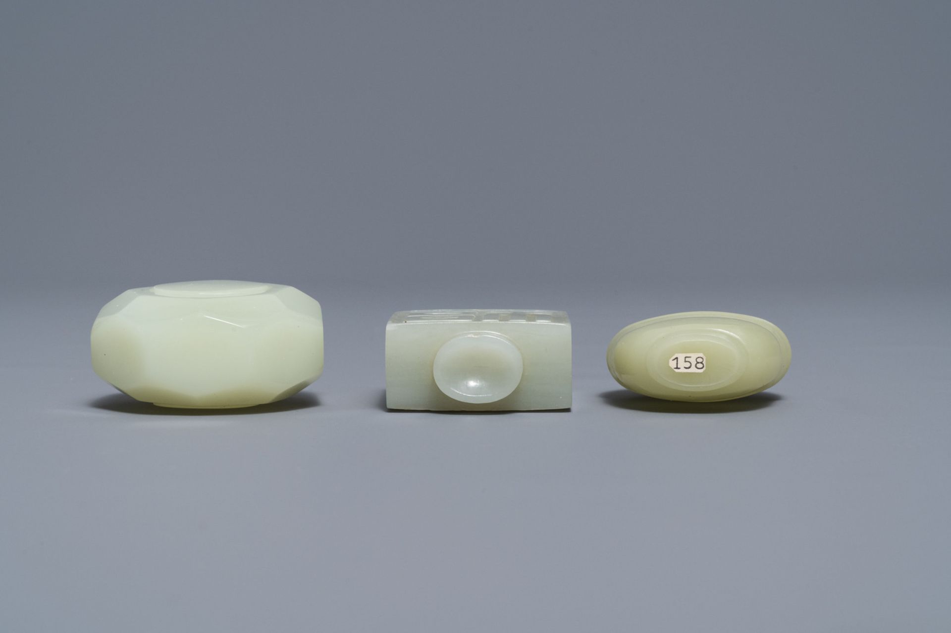 Three Chinese pale celadon jade snuff bottles, 19th C. - Image 4 of 4