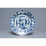 A Chinese blue and white kraak porcelain dish with figures in a landscape, Transitional period