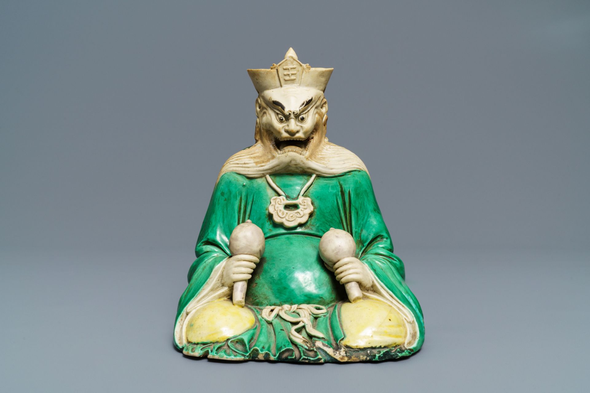 A Chinese verte biscuit figure of Yanluo, Kangxi