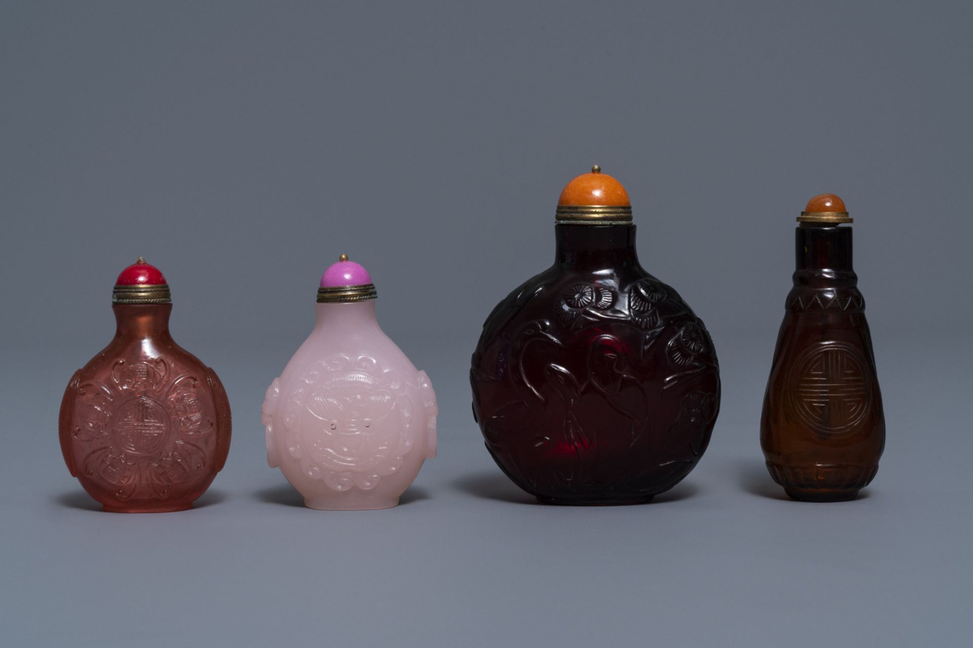 Four Chinese cherry red and pink glass snuff bottles, 19/20th C. - Image 2 of 4