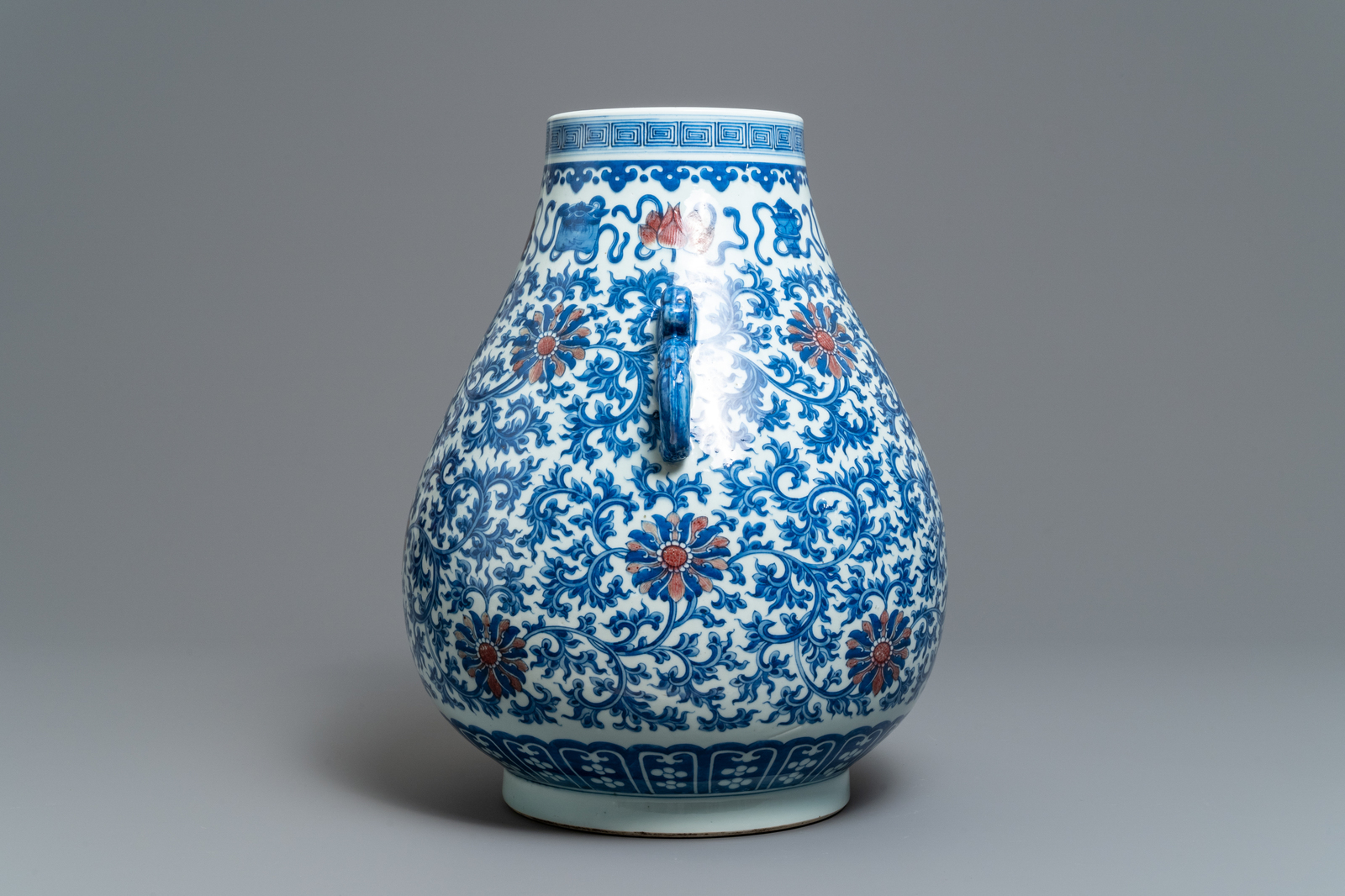 A Chinese blue, white and copper red 'hu' vase, Qianlong mark, 19/20th C. - Image 2 of 6