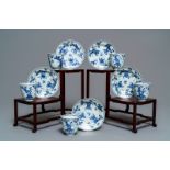 Five Chinese blue and white floral cups and saucers, Kangxi