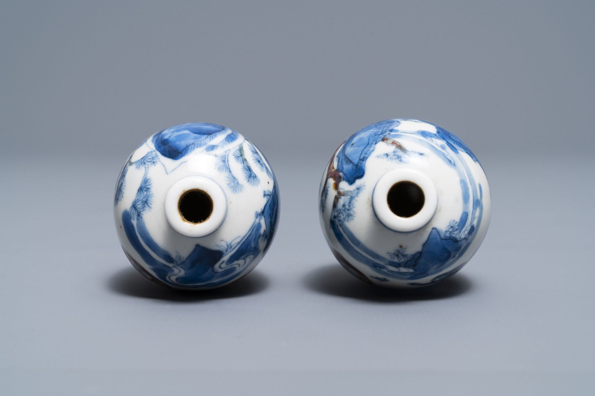 A pair of Chinese blue, white and underglaze red '16 monkeys' snuff bottles, Yongzheng mark, 19th C. - Image 6 of 7