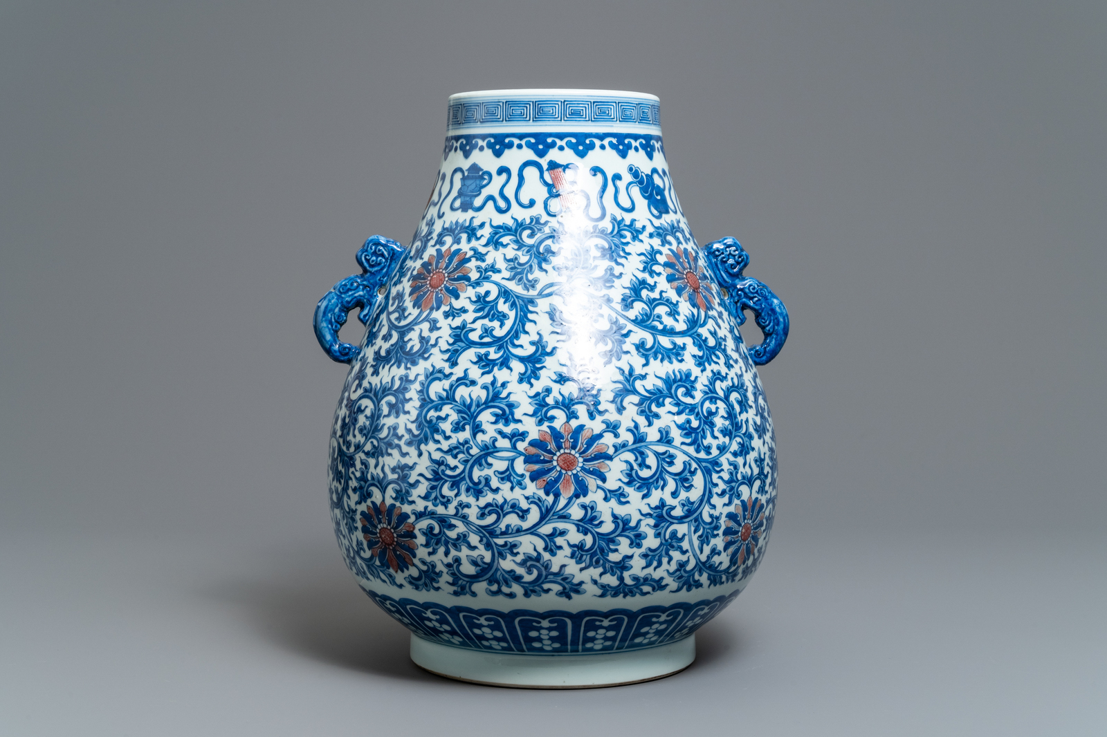 A Chinese blue, white and copper red 'hu' vase, Qianlong mark, 19/20th C.