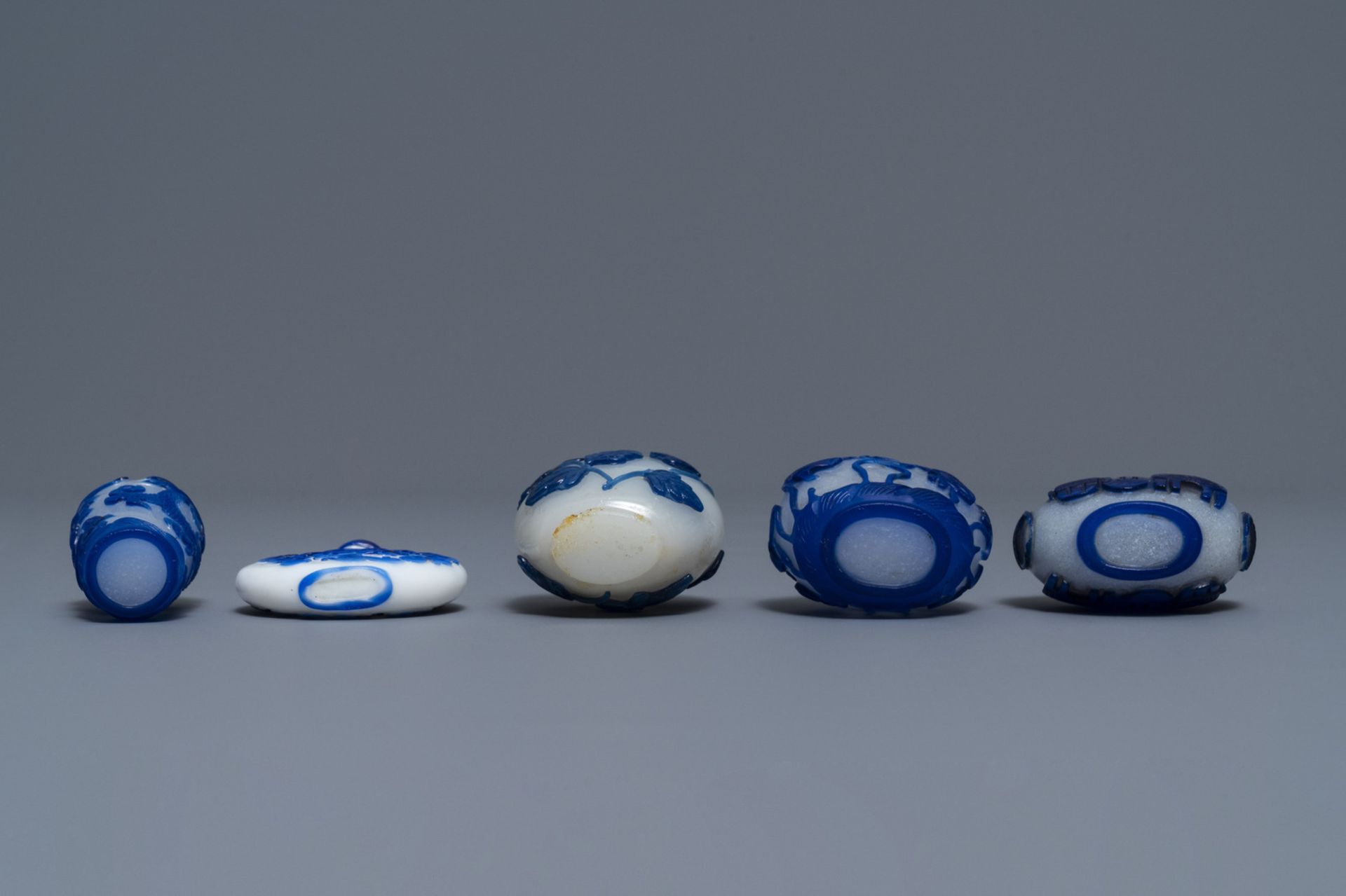 Nine various Chinese blue overlay glass snuff bottles, 19/20th C. - Image 5 of 9