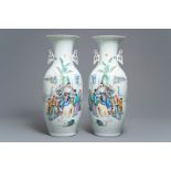 A pair of Chinese famille rose vases with scholars in a garden, 19/20th C.