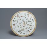 A round Chinese famille rose 'birds' plaque, 19th C.