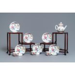 A Chinese famille rose teapot, six saucers and three cups, Yongzheng/Qianlong