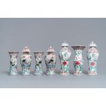 Two Chinese famille rose vase garnitures, Qianlong and 19th C.