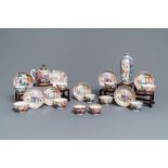 Eleven Chinese famille rose 'mandarin' cups, eight saucers, a teapot and a vase, Qianlong