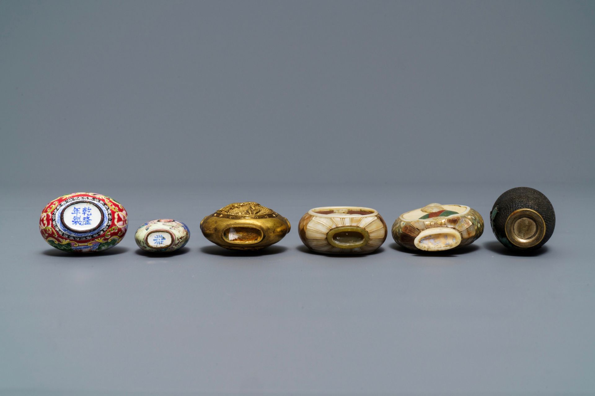 Six Chinese Canton and Beijing enamel, mother of pearl and gilt brass snuff bottles, 18/19th C. - Image 6 of 7