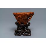 A Chinese carved rhinoceros horn 'libation cup', Ming/Qing