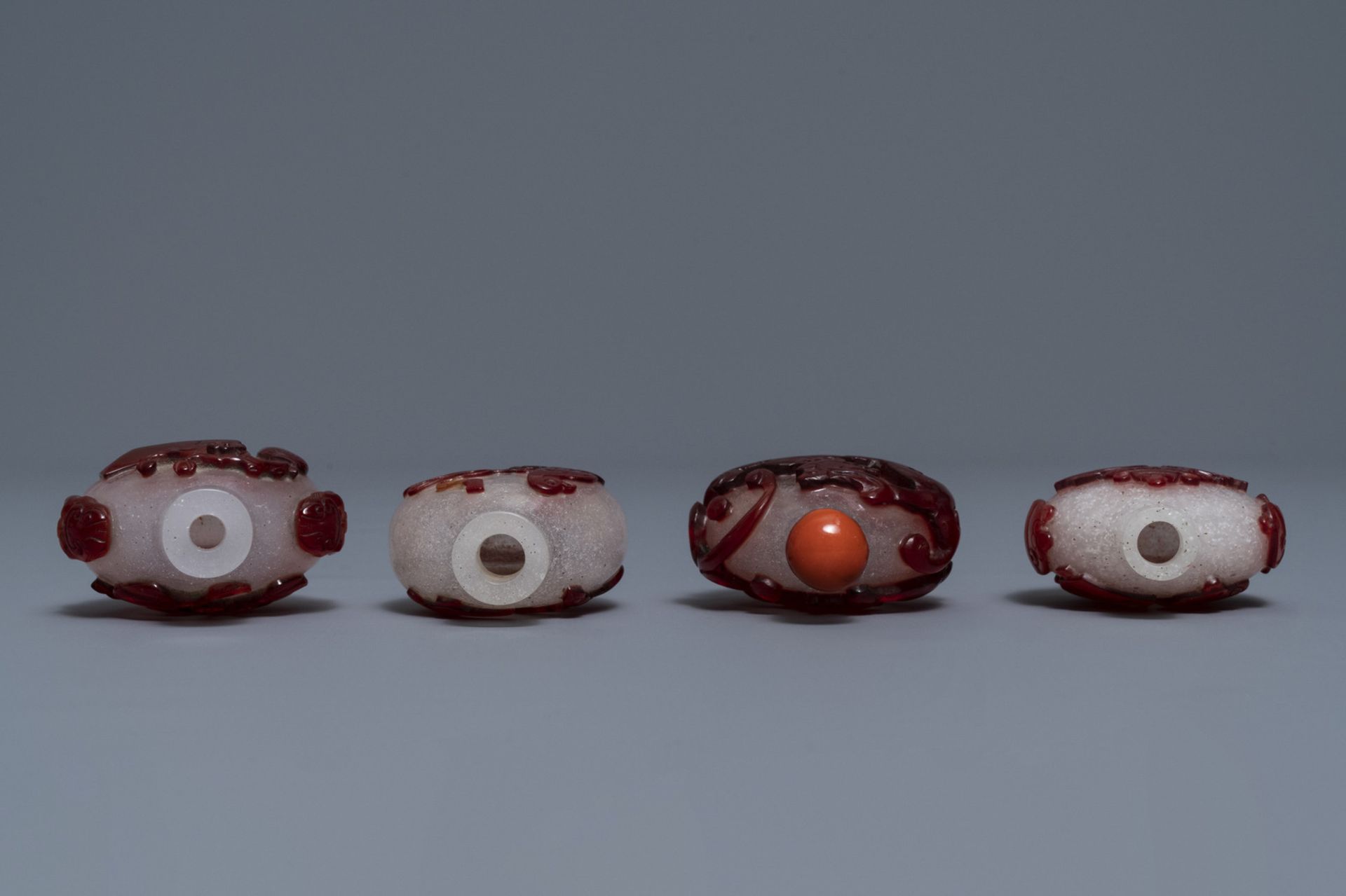 Four Chinese red overlay snowflake glass snuff bottles, 18/20th C. - Image 3 of 4
