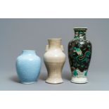 Three Chinese monochrome and famille noire vases, 19th C.