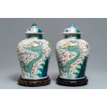 A pair of wucai-style vases and covers with dragons, Samson, Paris, 19th C