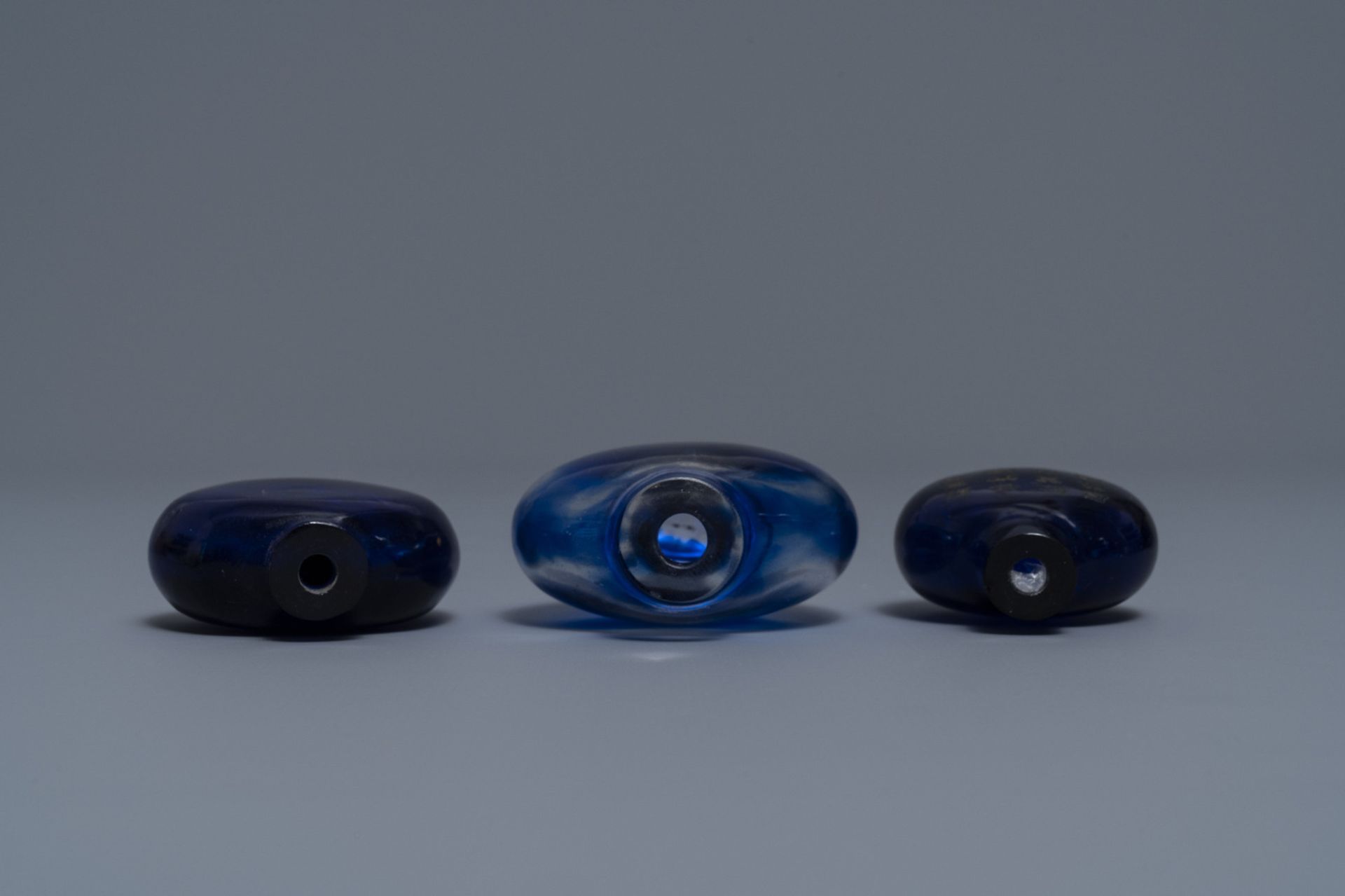 Three Chinese transparent blue glass snuff bottles, one inscribed, 18/19th C. - Image 3 of 4