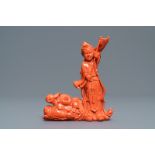 A Chinese carved coral group with a laughing Buddha, Republic, 20th C.