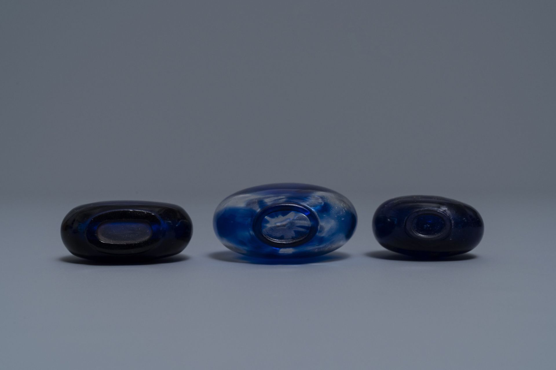 Three Chinese transparent blue glass snuff bottles, one inscribed, 18/19th C. - Image 4 of 4