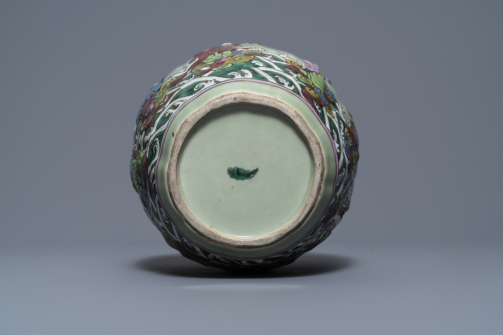 A Chinese relief-decorated famille rose celadon-ground vase, 19/20th C. - Image 7 of 7