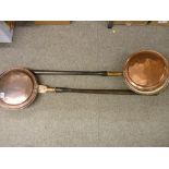 Two copper and long handled wooden bedwarmers