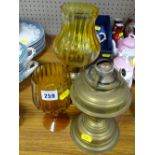 Vintage style candle lamp, brass spirit lamp base and an amber glass goblet with twist stem