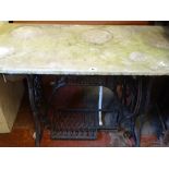 Singer treadle sewing machine base with marble top
