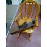 Small light wood rocking chair and a vintage wooden block plane