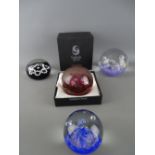 Four Scottish glass paperweights 'Selkirk', 'Caithness' and 'Edinburgh' star shaped millefiori