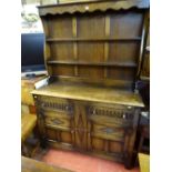 Excellent oak Priory style dresser with two drawers over two base cupboards